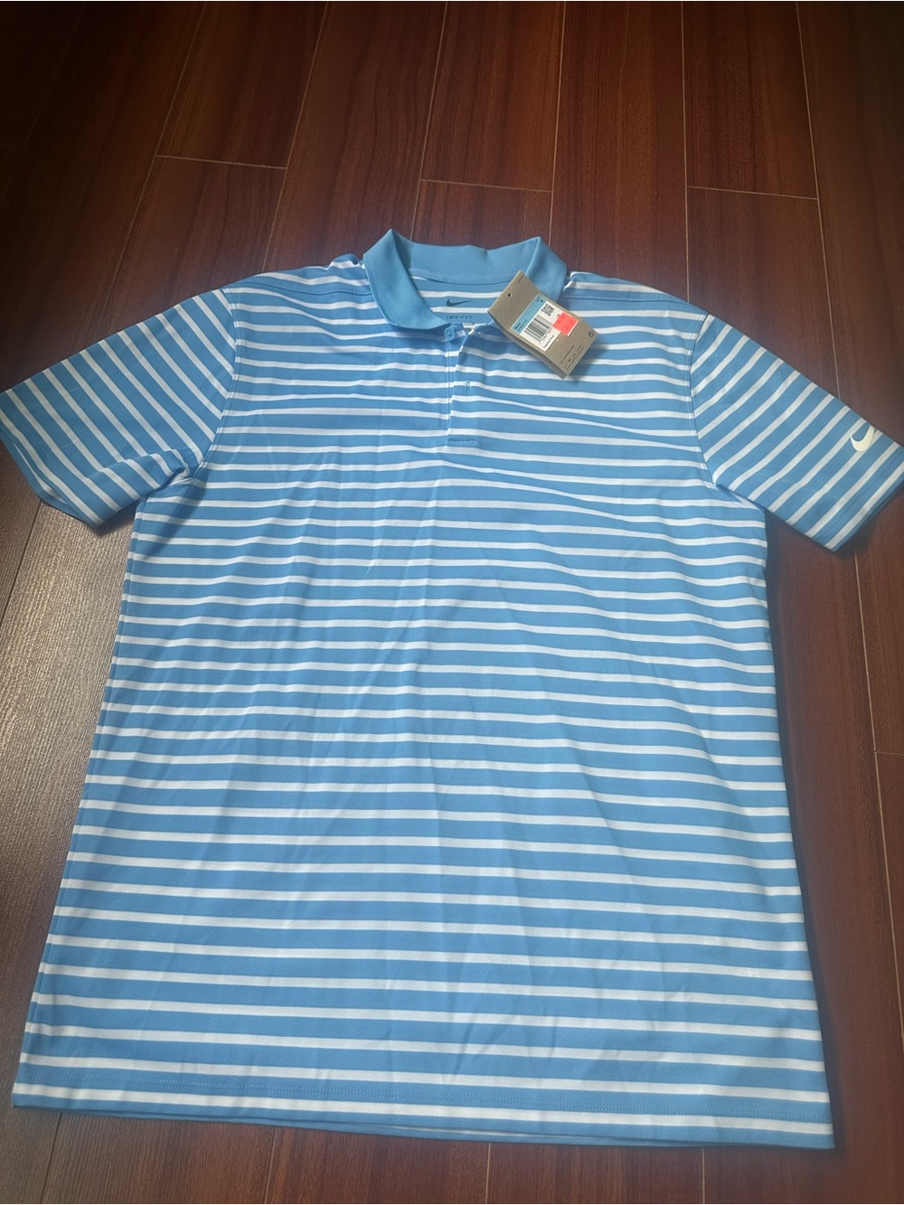 Nike Men’s Light Blue and White Striped Polo